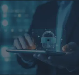 Man holding tablet and cybersecurity graphic